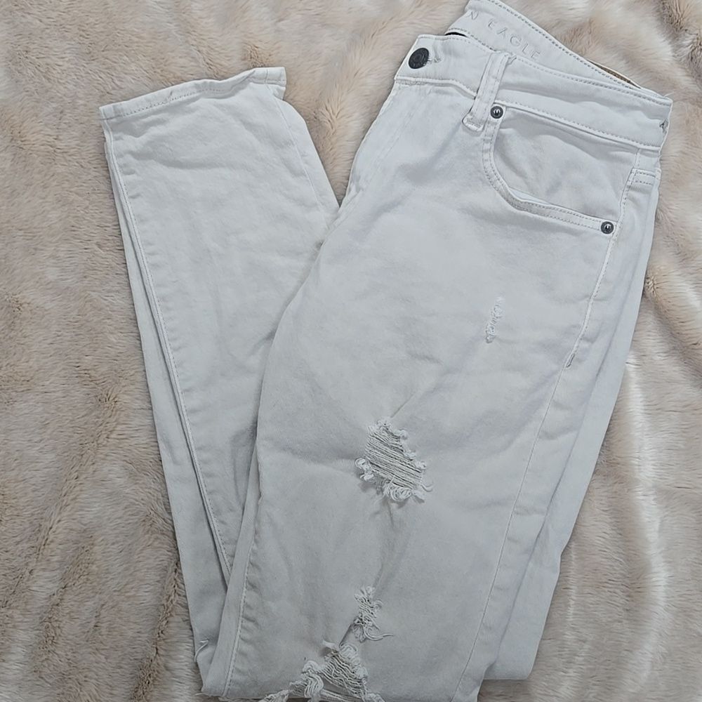 AMERICAN EAGLE AIRFLEX 360 TAN DISTRESSED JEANS, SIZE 33x32